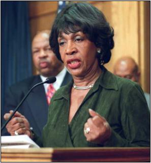 Maxine Waters speaking from a podium