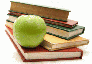 schoolbooks with an apple
