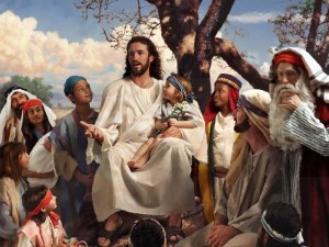 Jesus teaching, with children and others surrounding him