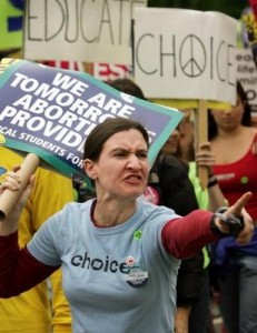 Pro-Choice activist snarling and pointing