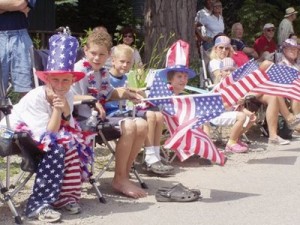 fourth of july - kids sitting along parade route