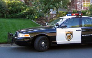 police car parked on residential street