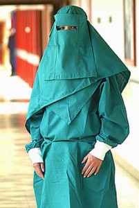 woman in full burqa - green