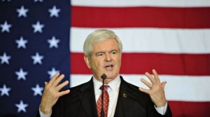 Gingrich speaking in front of American flag