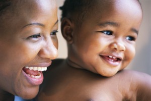 Black mother and child, smiling